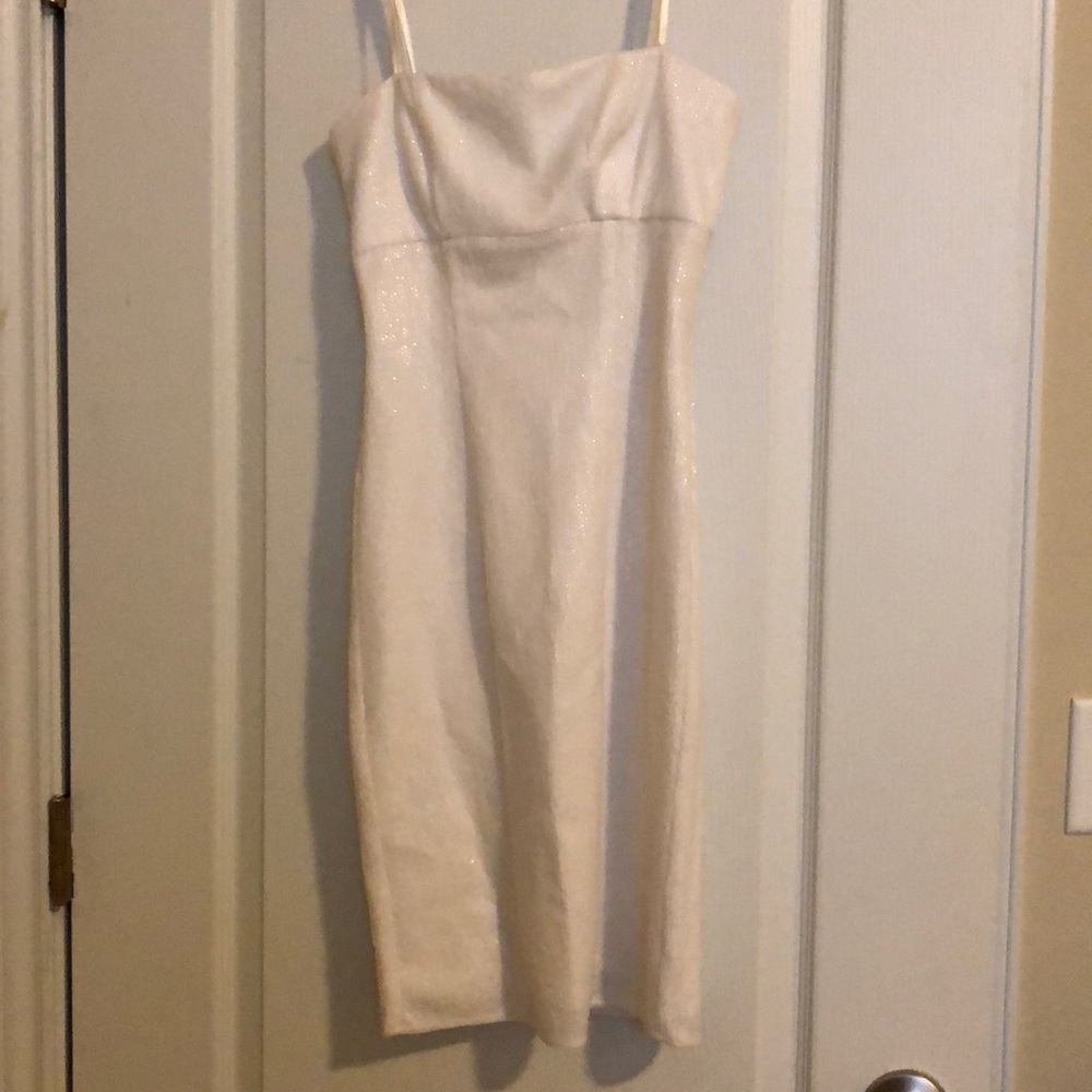 Fitted sequined white strapless dress